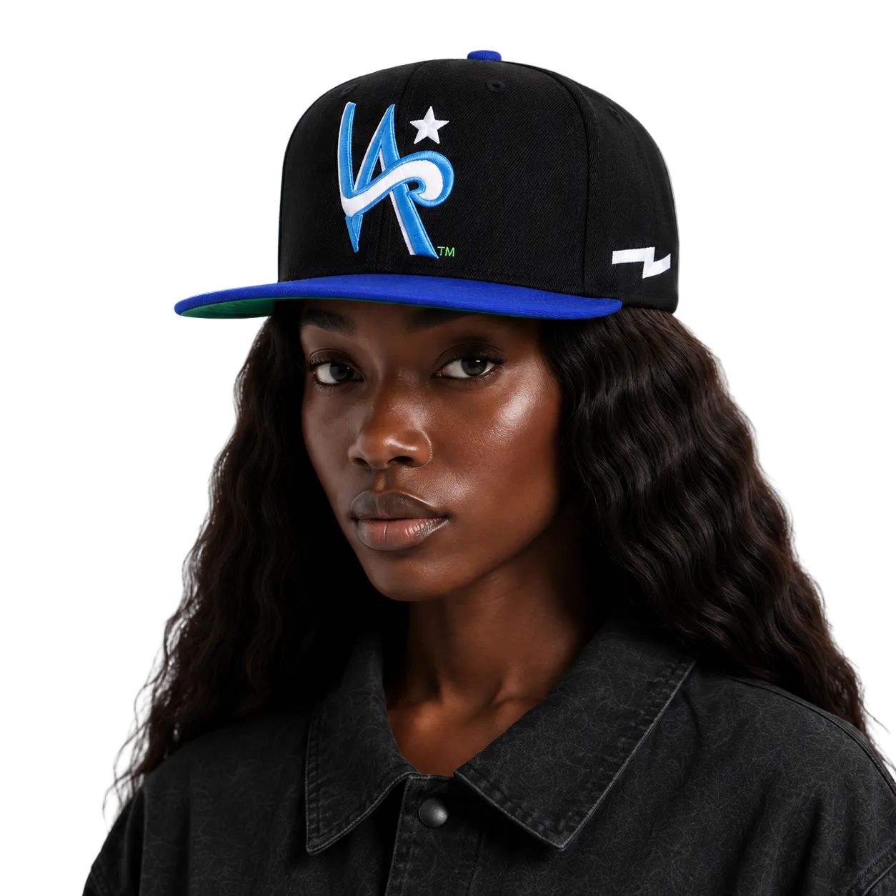 A woman wearing a black flat-brim cap with a blue brim, featuring a blue and white stylized 'KR' logo on the front and a white logo on the side, set against a plain light gray background.